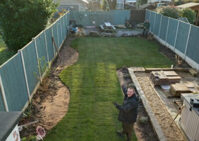 new curved lawn and planting borders