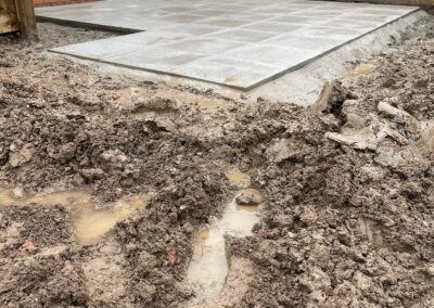 Paving completed, but the lawn was delayed for a few weeks for soil to dry out